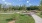 beautiful landscaping with walkways and playground