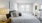 well lit bedroom with private bathroom
